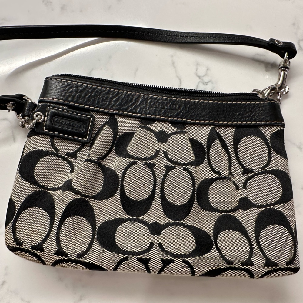Coach logo wristlet black.